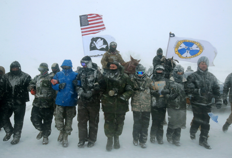 Veterans in support of Standing Rock march through a blizzard December 5, 2016.